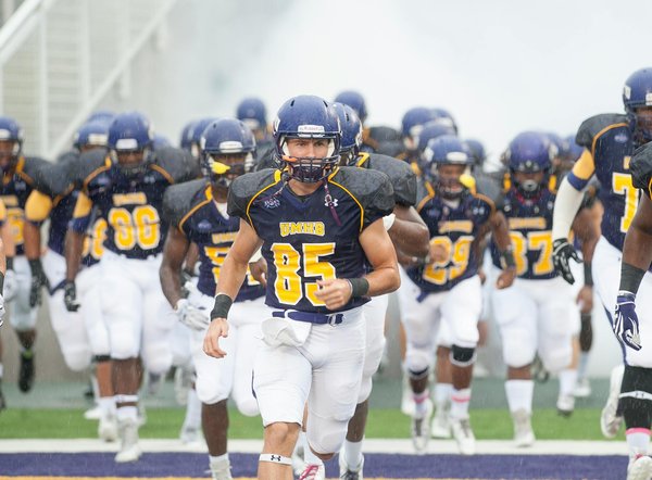 How do you prepare a traditional Sunday roast with all the trimmings?